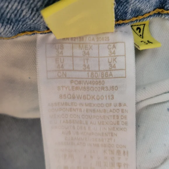 Guess X Chinatown Market Jeans with Yellow Smiley Knees